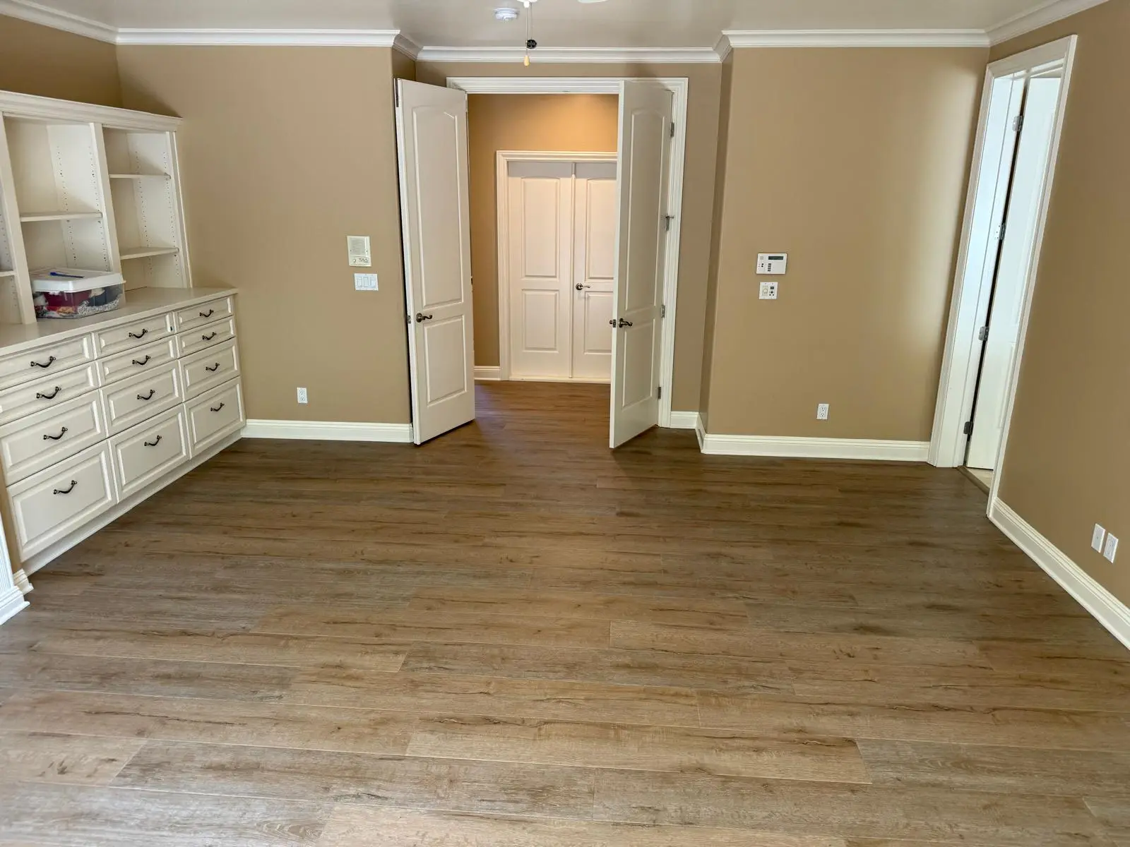 Living space in a Sacramento home photographed after an Essential Flooring installation