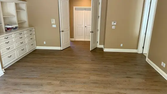 Living space in a Sacramento home photographed after an Essential Flooring installation