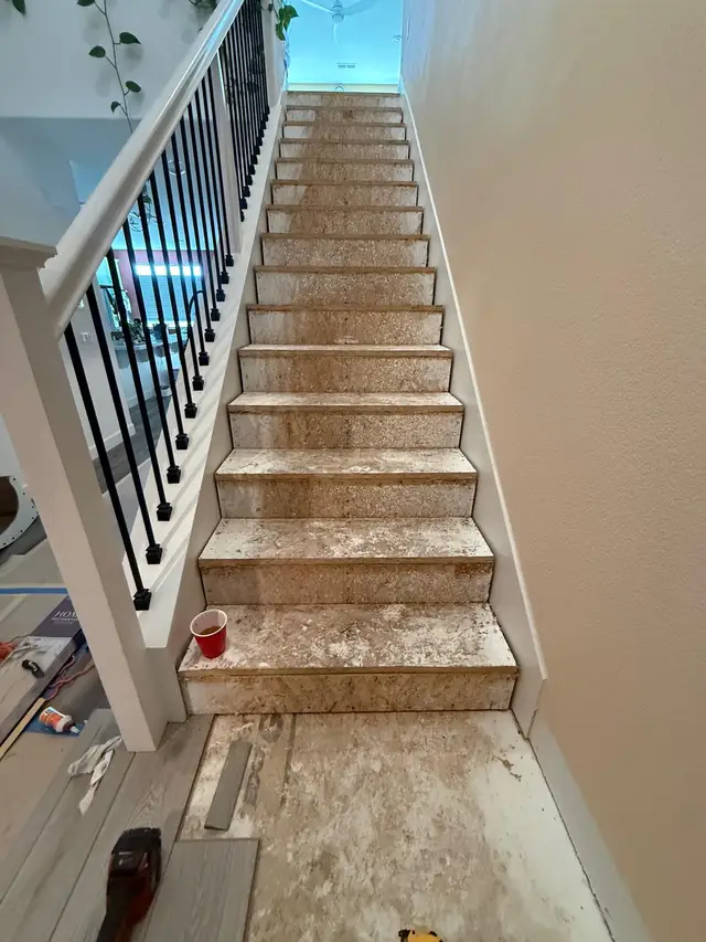 Staircase subfloor prepped for luxury vinyl plank installation in Folsom home
