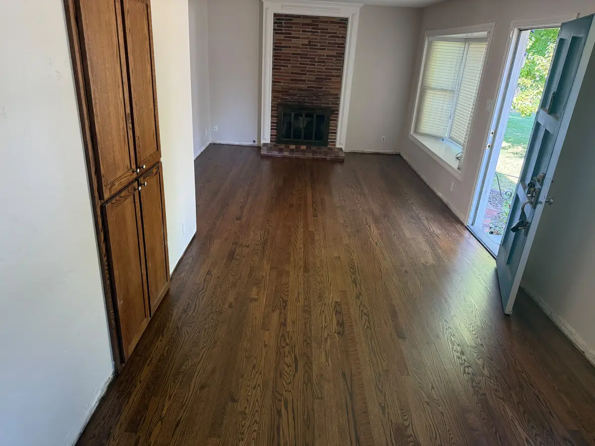 Oak floor sanded back and refinished in a warm walnut tone, Carmichael